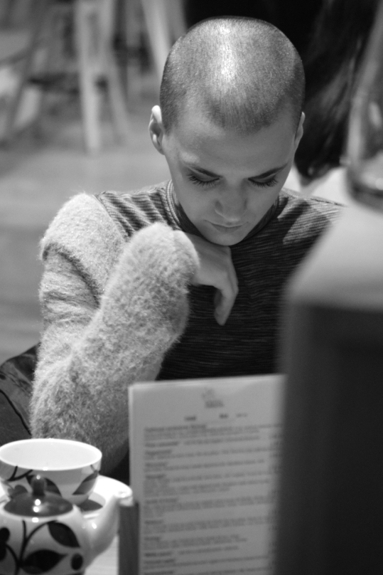 woman reading short haircut